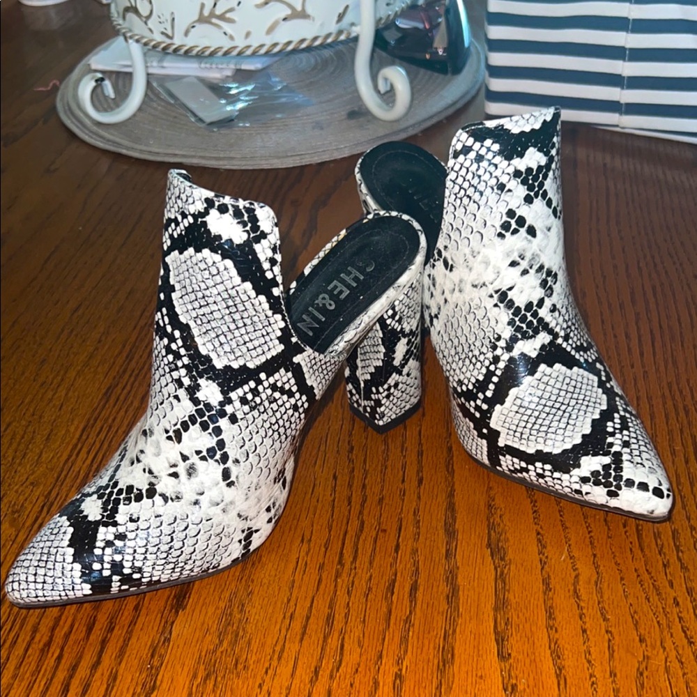 Snake skin slip on booties.